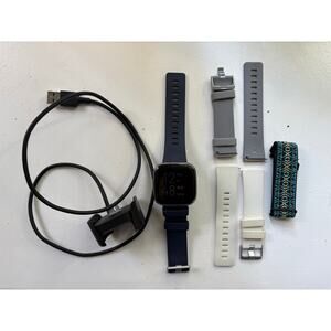 Fitbit Versa 2 with accessories and charger